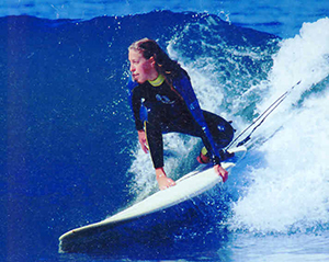 Paradise Surf Shop owner Sara Bray Zimmerman surfing in Santa Cruz