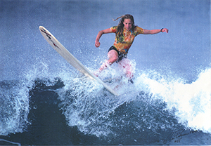 Sara Bray Zimmerman surfing, photo by Jim pidgeon